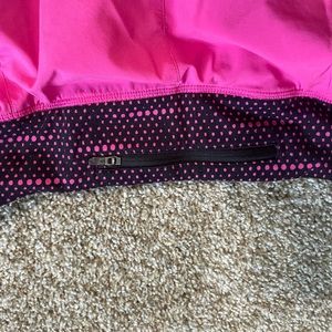 Hot pink Nike running shorts
